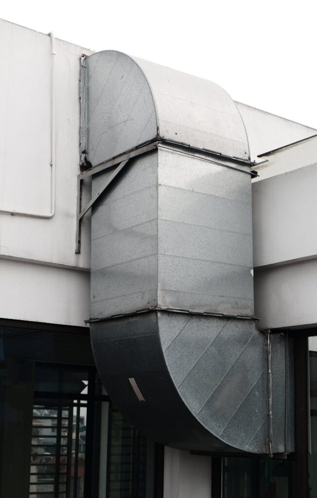pexels-photo-19431067 Close-up of a contemporary ventilation duct exterior in a city setting.